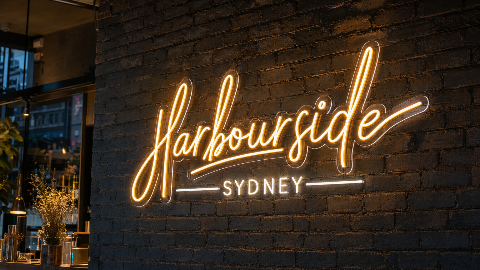 Custom LED Neon Sign Sydney CBD Custom LED neon sign glowing in warm amber tones inside a Sydney CBD bar